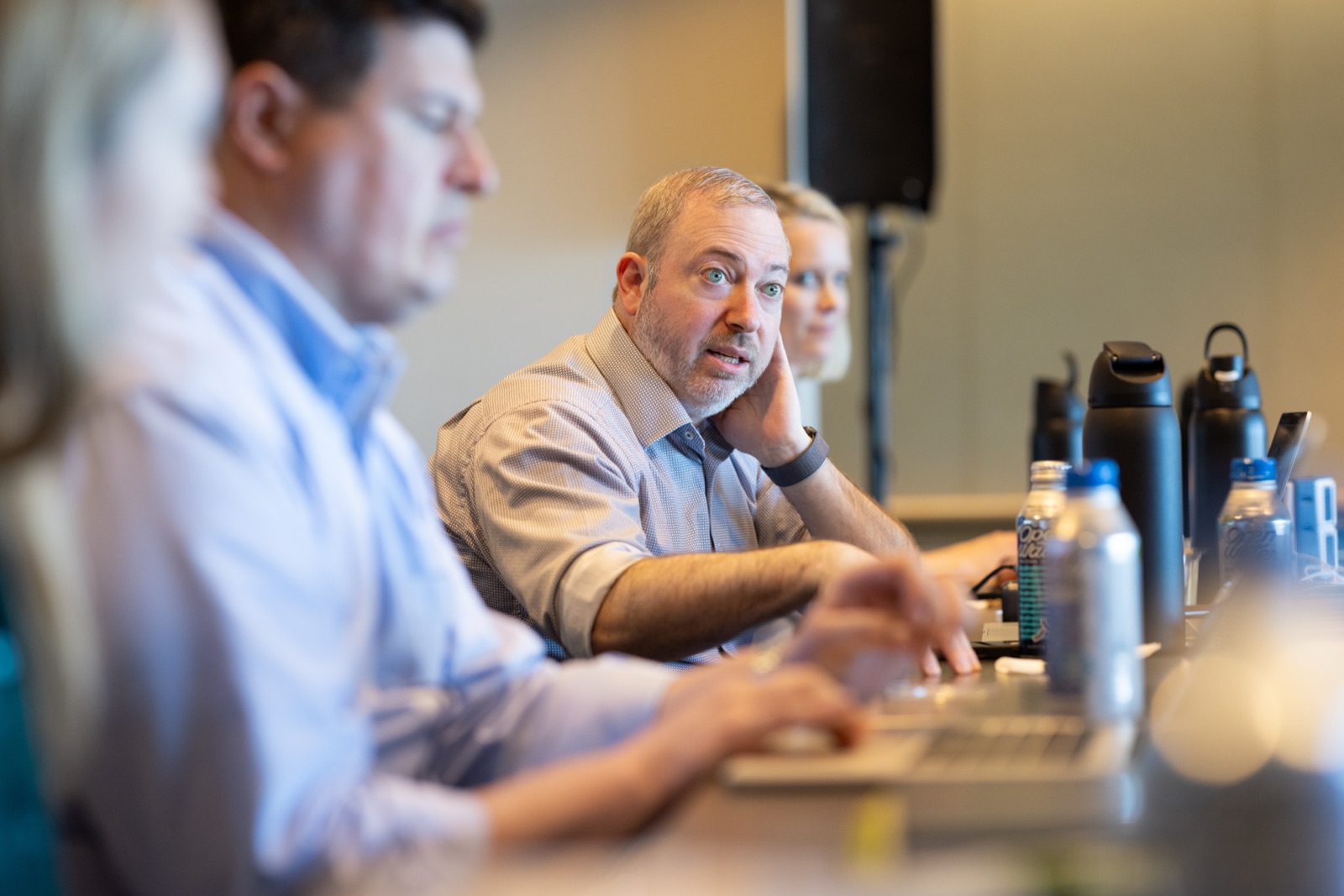 Researchers at work in the commercial sector that now hosts national-security AI capability.